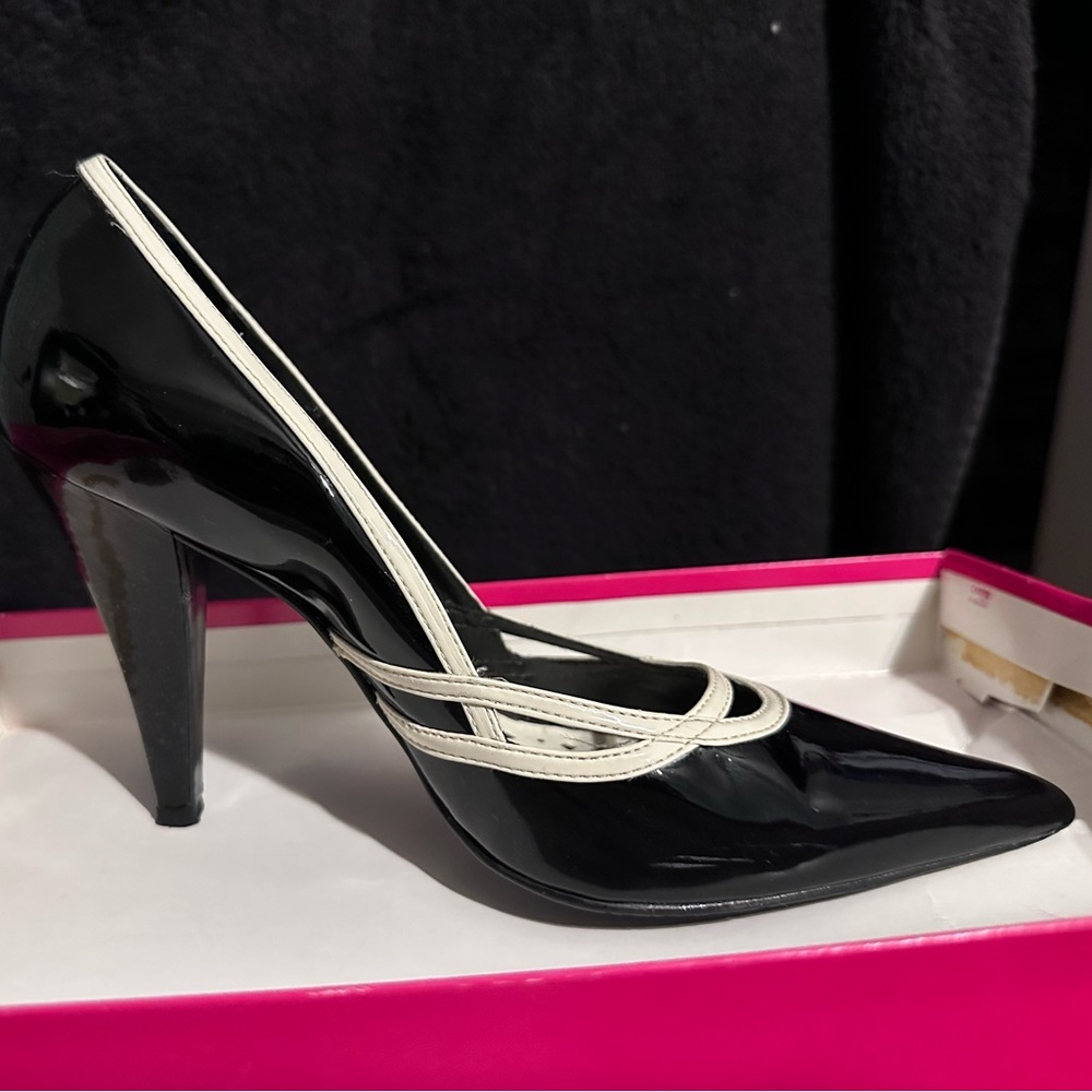 BCBGirl BG-black kid heel. Shiny black with white